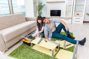pngtree young family assembling furniture at new house home relocating installation photo image 33274146